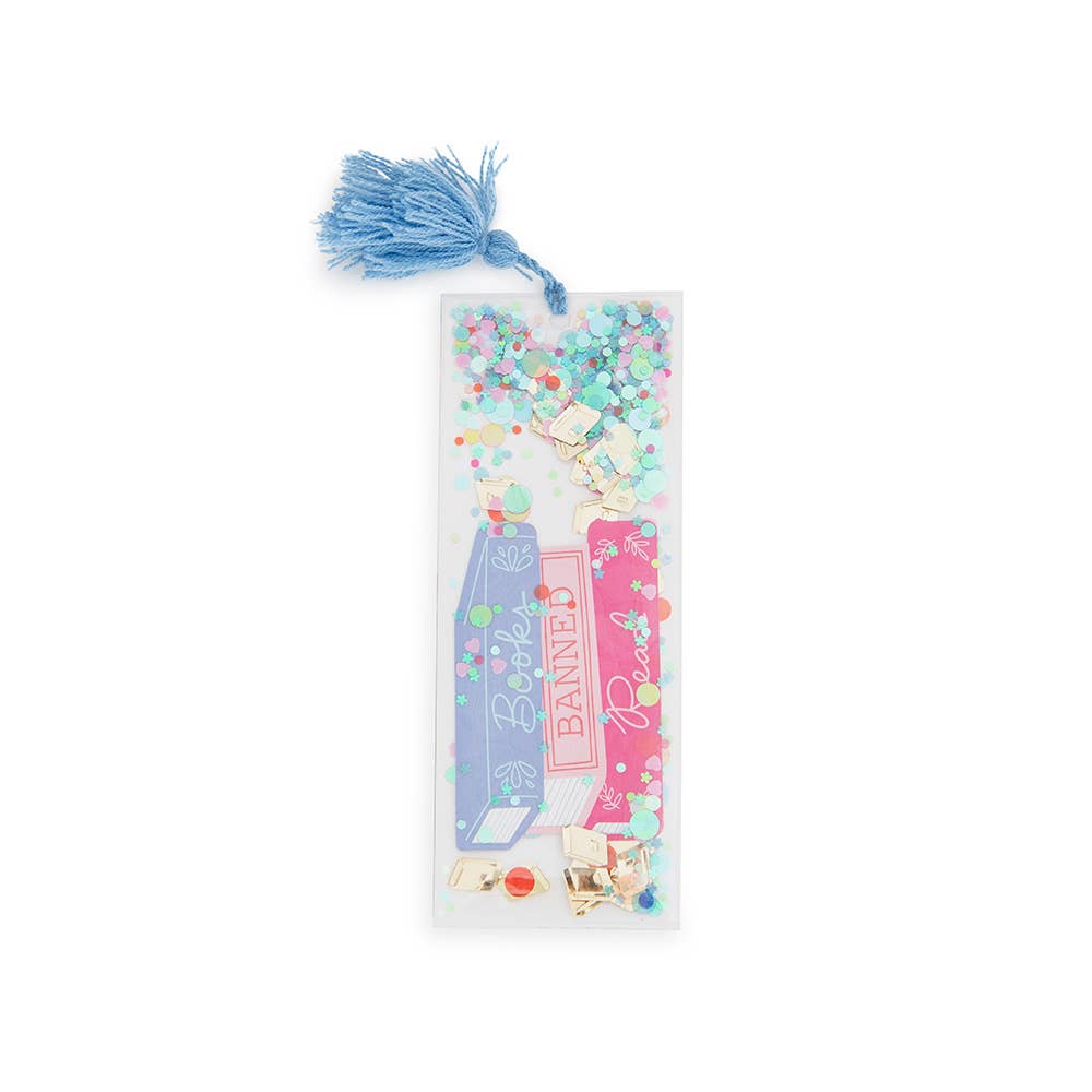 Clear confetti-filled bookmark showing a stack of pastel book spines with a blue yarn tassel